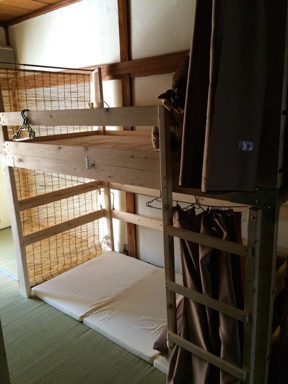 Guesthouse Sunanoshiro Осака Стая снимка