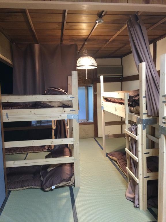 Guesthouse Sunanoshiro Осака Стая снимка