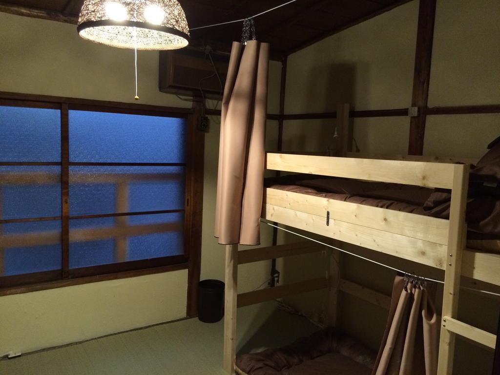 Guesthouse Sunanoshiro Осака Стая снимка